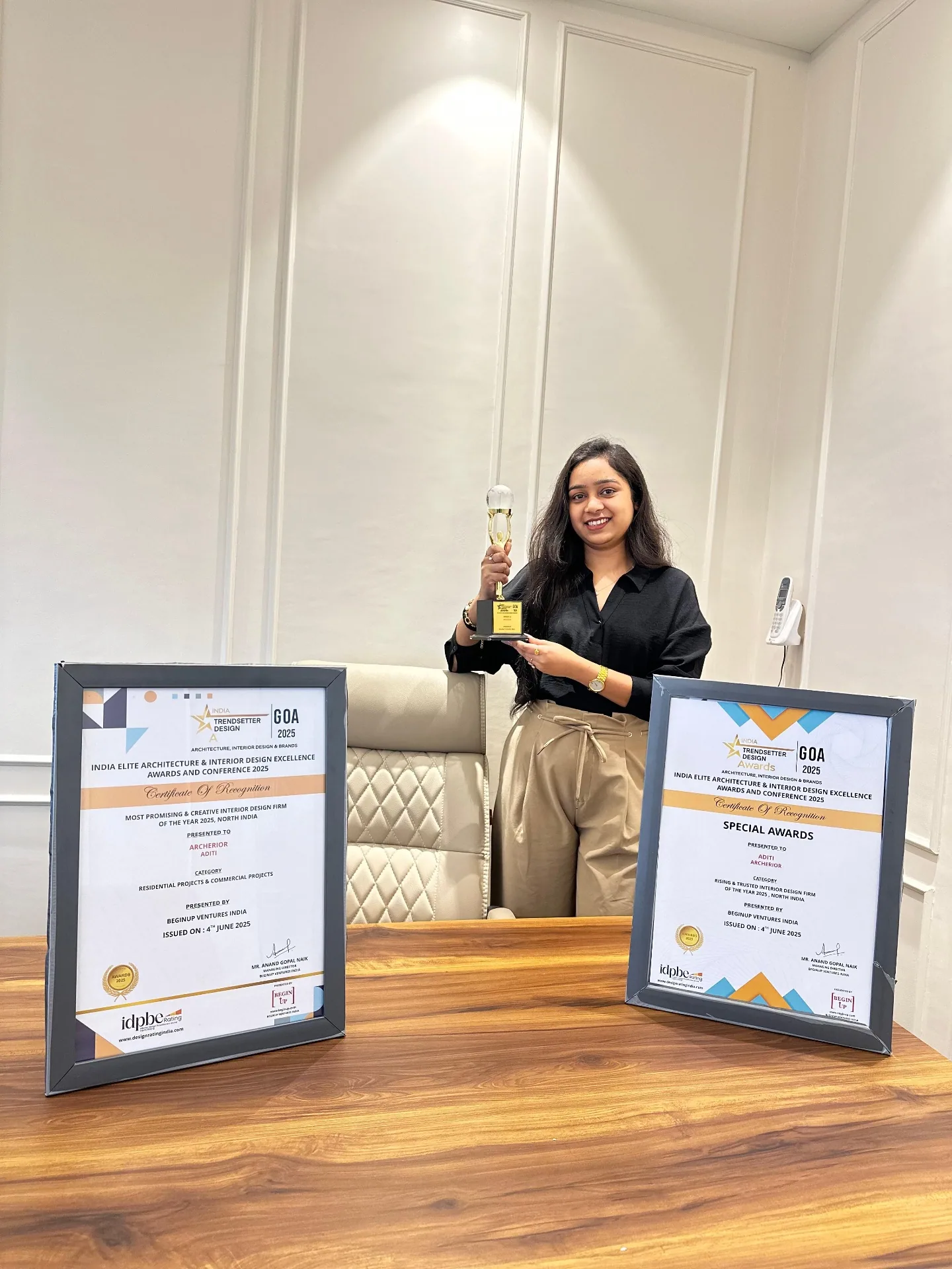 Aditi Bansal of Archerior with the studio's two National Award certificates from the India Elite Architecture & Interior Design Excellence Awards 2025, Goa.
